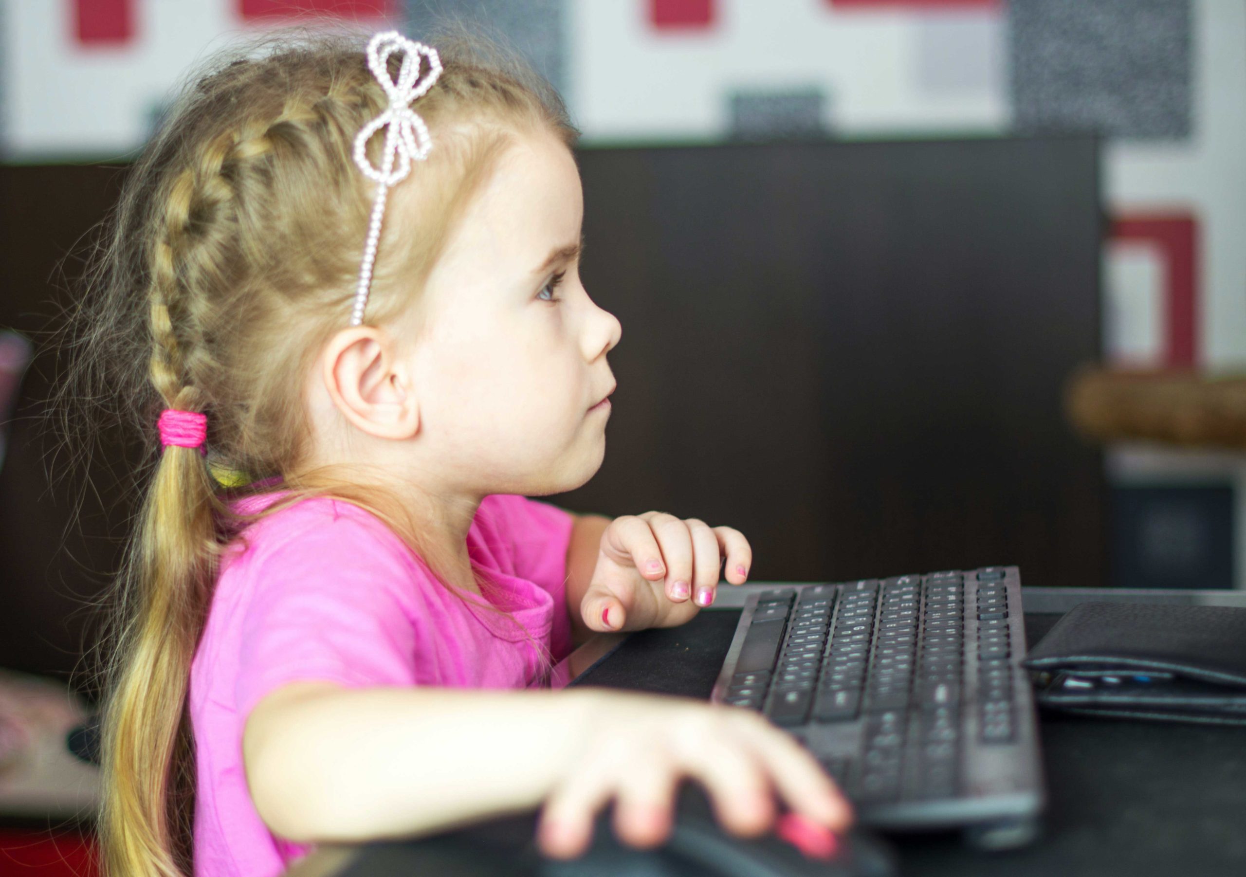 young child using a computer