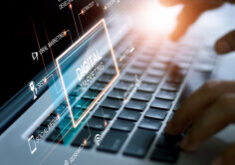 Digital marketing network connection concept. Businessman hand working on laptop computer with graphical user interface icons on strategy, solution analysis and development contents.